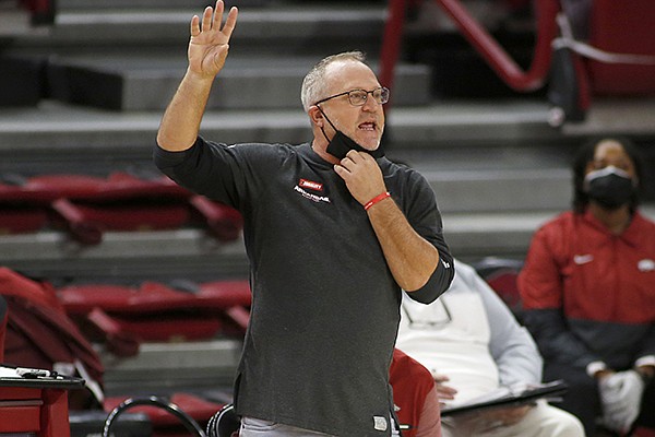 Arkansas coach Mike Neighbors is shown during a game against Oral Roberts on Wednesday, Nov. 25, 2020, in Fayetteville. 