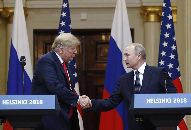 President Donald Trump greets Russian President Vladimir Putin at a news conference after their meeting in Helsinki in July 2018. Trump suggested a “Pakistani gentleman” could have stolen Democrats’ emails during the 2016 campaign despite his own intelligence agencies citing it as part of Moscow’s election interference.
(AP/Alexander Zemlianichenko)