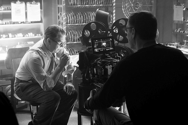Writer and alleged genius Herman J. Mankiewicz (Gary Oldman) works in the editing room on “Citizen Kane” with an editor played by Erik Messerschmidt, who served as the actual cinematographer on “Mank,” David Fincher’s deep dive into the making of that classic movie.
(Netflix)
