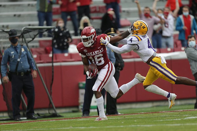 Arkansas wide receiver Treylon Burks, who leads the Razorbacks with six touchdown catches, has had a breakout year in which he’s had 90-plus-yard games fi ve times.
(NWA Democrat-Gazette/Charlie Kaijo)