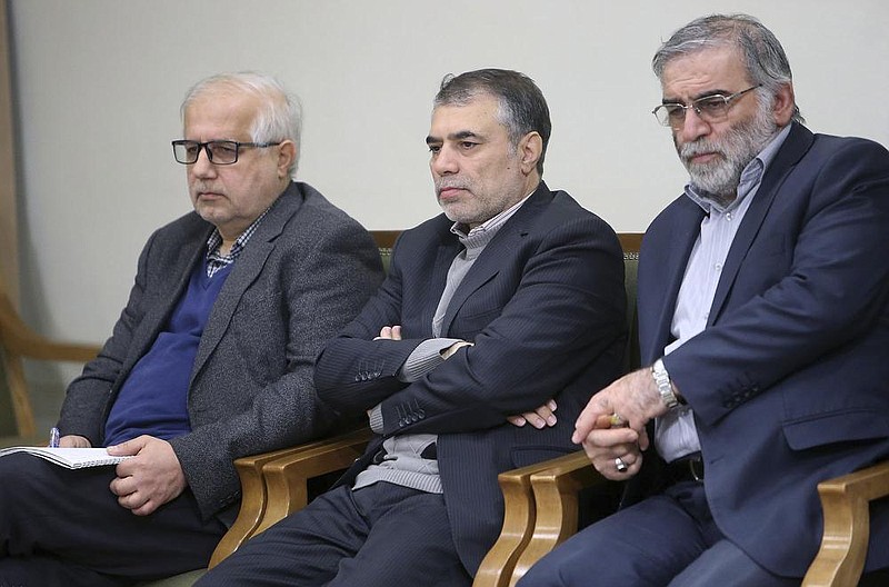 Mohsen Fakhrizadeh (right) and two unidentified men attend a meeting with Iranian Supreme Leader Ayatollah Ali Khamenei in Tehran in January 2019. The nuclear scientist was killed in an attack Friday east of Tehran.
(AP/Office of the Iranian Supreme Leader)