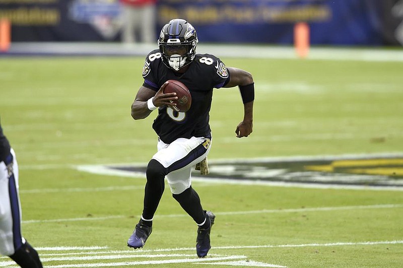 Quarterback Lamar Jackson is one of more than a dozen Baltimore Ravens players on the reserve/covid-19 list, and he will not play in Tuesday’s game against the Pittsburgh Steelers in a matchup that has been rescheduled twice.
(AP/Gail Burton)