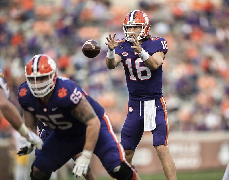 Clemson quarterback Trevor Lawrence threw for 403 yards and two touchdowns in his first game in five weeks as the Tigers defeated Pittsburgh 52-17 on Saturday.
(AP/The Independent-Mail/Ken Ruinard)