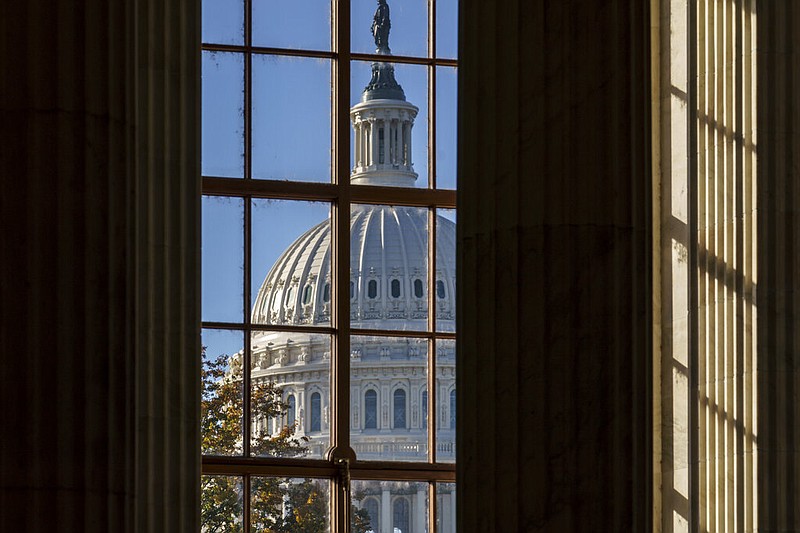 FILE - In this Nov. 10, 2020, file photo the morning sun illuminates the rotunda of the Russell Senate Office Building on Capitol Hill in Washington. After months of shadowboxing amid a tense and toxic campaign, Capitol Hill's main players are returning to Washington for one final, perhaps futile, attempt at deal making on a challenging menu of year-end business. (AP Photo/J. Scott Applewhite, File)

