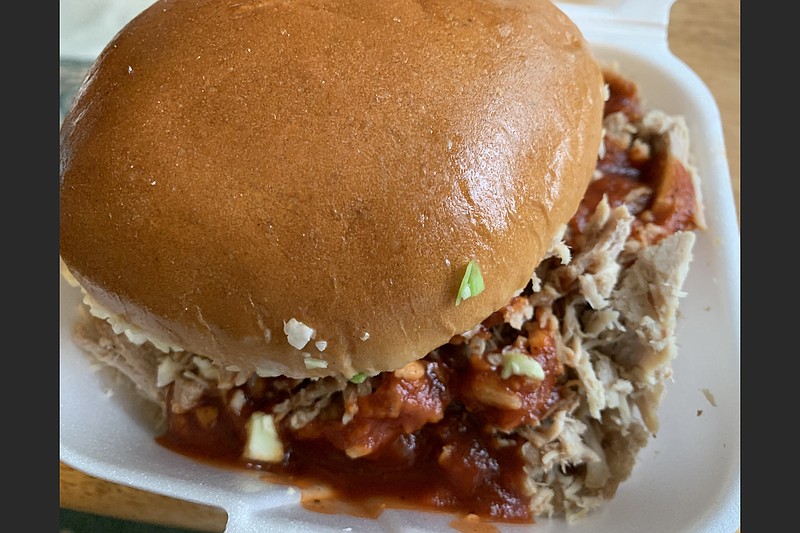 The chopped pork sandwich from the McClard's food truck comes with slaw and the Hot Springs restaurant's classic sauce. (Arkansas Democrat-Gazette/Eric E. Harrison)