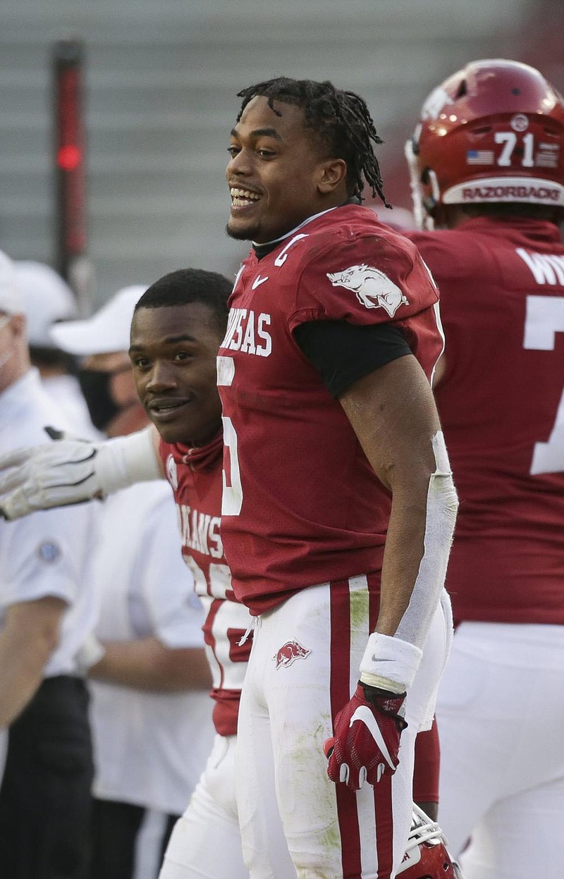 Arkansas running back Rakeem Boyd (5) reacts, Saturday, October 17, 2020 during the fourth quarter of a football game at Donald W. Reynolds Razorback Stadium in Fayetteville. Check out nwaonline.com/201018Daily/ for today's photo gallery. 
(NWA Democrat-Gazette/Charlie Kaijo)

