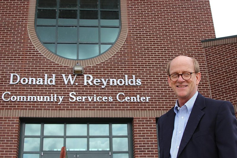 Fred Reed stands in front of the Donald W. Reynolds Community Services Center in downtown Pine Bluff. Of the hundreds of buildings he designed, it’s one of his favorite projects. 
(Special to The Commercial/Deborah Horn)