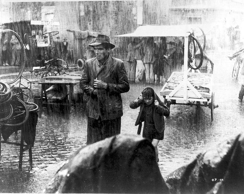 Working-class laborer Antonio (Lamberto Maggiorani) and his young son Bruno (Enzo Staiola) set out to recover a stolen bicycle and their dignity in Italian Vittorio De Sica’s neo-realistic classic from 1948, “Bicycle Thieves.”