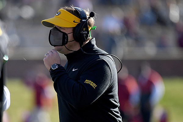 Missouri head coach Eli Drinkwitz watches from the sidelines during the second half of an NCAA college football game against Arkansas Saturday, Dec. 5, 2020, in Columbia, Mo. (AP Photo/L.G. Patterson)


