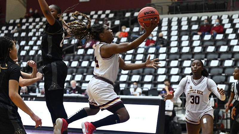 UALR guard Mayra Caicedo drives to the basket Saturday during the Trojans’ 82-74 victory over Vanderbilt at the Jack Stephens Center in Little Rock. Caicedo scored 14 points and had a school-record 14 assists in the victory.
(Photo courtesy UALR Athletics)