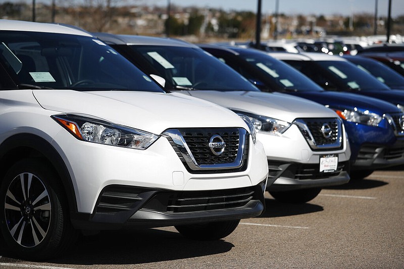 FILE - In this Sunday, March 22, 2020, file photograph, a row of unsold 2020 Kicks SUVs sit at a Nissan dealership in Highlands Ranch, Colo. (AP Photo/David Zalubowski, File)