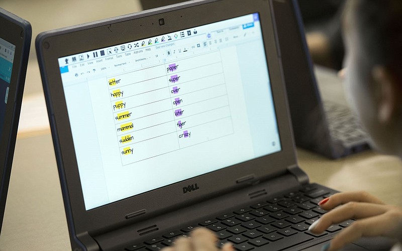FILE — A third-grade student studies on a Chromebook computer at Mary Mae Jones Elementary in Bentonville in this November 2017 file photo.