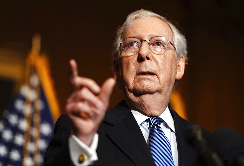 Senate Majority Leader Mitch McConnell of Kentucky speaks to the media after the Republican's weekly Senate luncheon on Tuesday, Dec. 8, 2020, at the Capitol in Washington.
