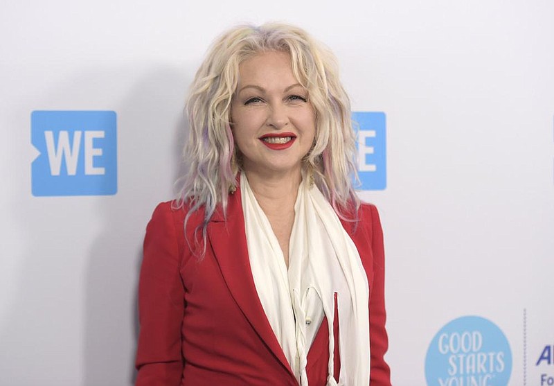 In a Thursday, April 19, 2018 file photo, Cyndi Lauper arrives at WE Day California at The Forum, in Inglewood, Calif. 
(Photo by Richard Shotwell/Invision/AP, File)