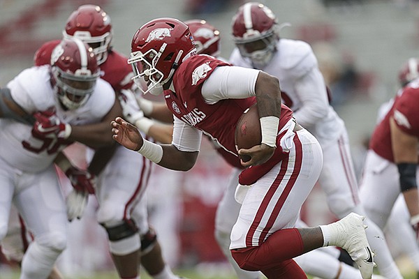 Arkansas quarterback KJ Jefferson runs with the ball during a game against Alabama on Saturday, Dec. 12, 2020, in Fayetteville.