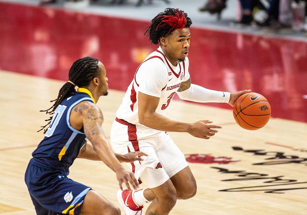 Guard Desi Sills (right), a junior from Jonesboro, said he’s glad Arkansas is playing UCA today. “It’s going to be mad cool because a lot of guys in state want to play UALR, UCA, A-State,” Sills said. “We always wanted that because I feel like it’s going to get Arkansas a lot of attention and we’ll see who the best in Arkansas is.”
(Special to the NWA Democrat-Gazette/David Beach)