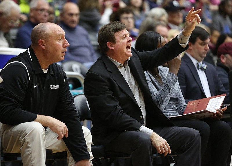 UALR head coach Joe Foley calls a play from the bench during the fourth quarter of the Trojans' 50-47 loss to Texas State on Thursday, Feb. 13, 2020, at the Jack Stephens Center in Little Rock. 

(Arkansas Democrat-Gazette/Thomas Metthe)