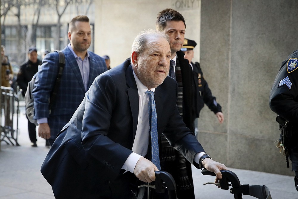 Harvey Weinstein arrives at a Manhattan courthouse as jury deliberations continue in his rape trial in New York on Feb. 24. Weinstein was transferred to a state prison in New York on March 18, to begin a 23-year sentence for rape and sexual assault in his landmark #MeToo case. (John Minchillo/AP file)