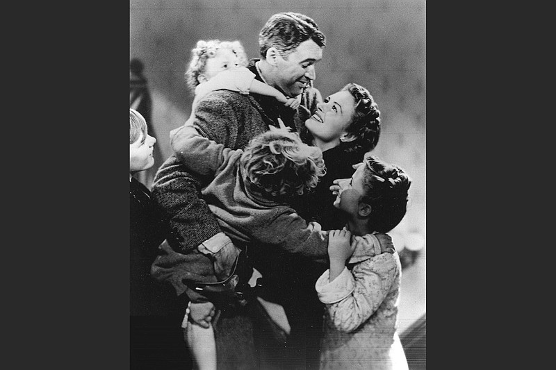 James Stewart, Donna Reed and kids form a fortunate family in “It’s a Wonderful Life.” (Democrat-Gazette file photo)