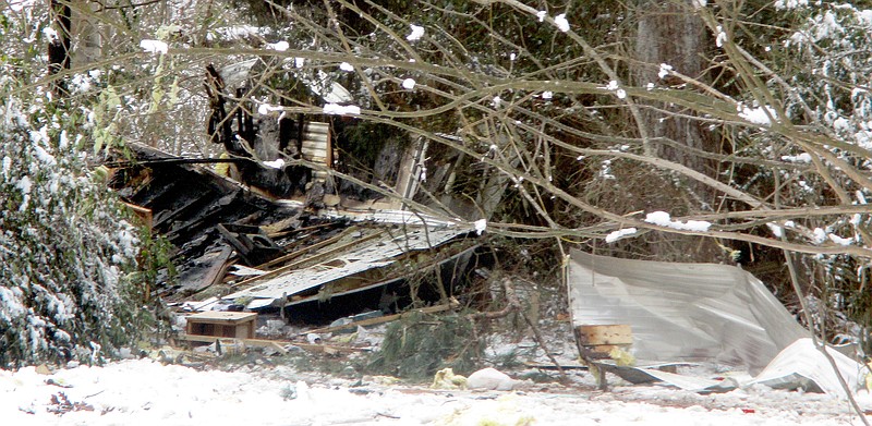 Debris on a property off Bill Young Road near Siloam Springs. One man was killed and two others were injured. (Siloam Springs Herald-Leader/MARC HAYOT)