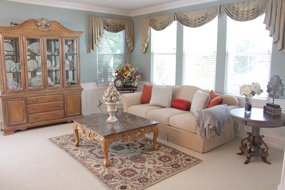 In this living space, valances are used to add color and pattern. (Design Recipes via TNS)