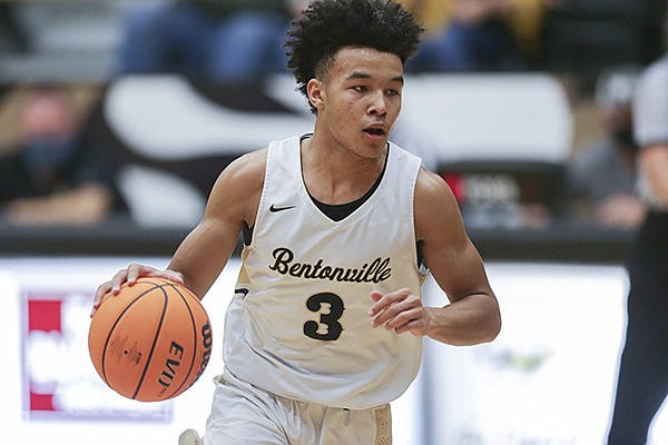 Bentonville guard Jaylen Lee (3) dribbles the ball during a game against Little Rock Central on Saturday, Nov. 14, 2020, in Bentonville. Bentonville guard Jaylen Lee (3) dribbles the ball during a game against Little Rock Central on Saturday, Nov. 14, 2020, in Bentonville.