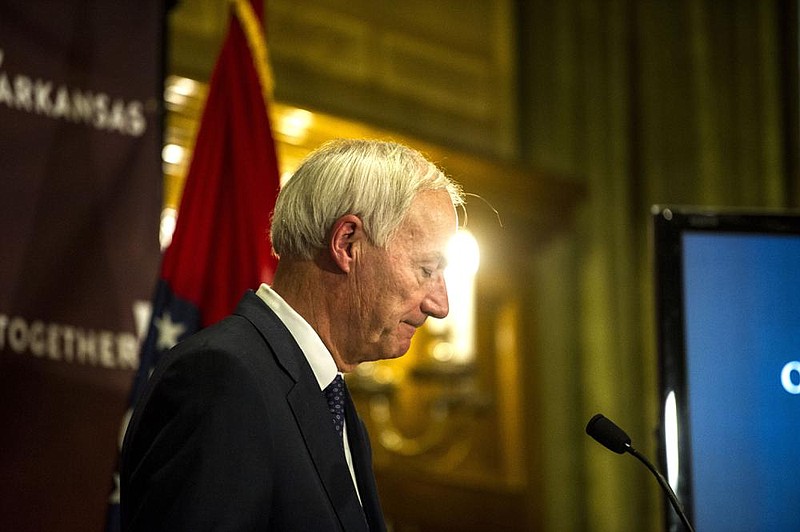 Governor Hutchinson addresses the media during a weekly address on Arkansas’ response to COVID-19 on Tuesday, Dec. 22. (Arkansas Democrat-Gazette/Stephen Swofford)