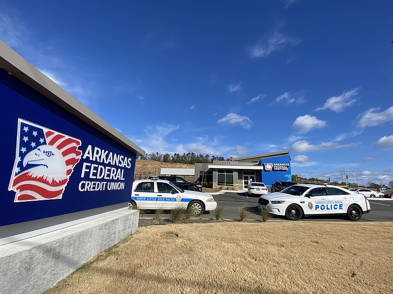 North Little Rock police respond to a robbery Thursday morning at an Arkansas Federal Credit Union on Maumelle Boulevard.
