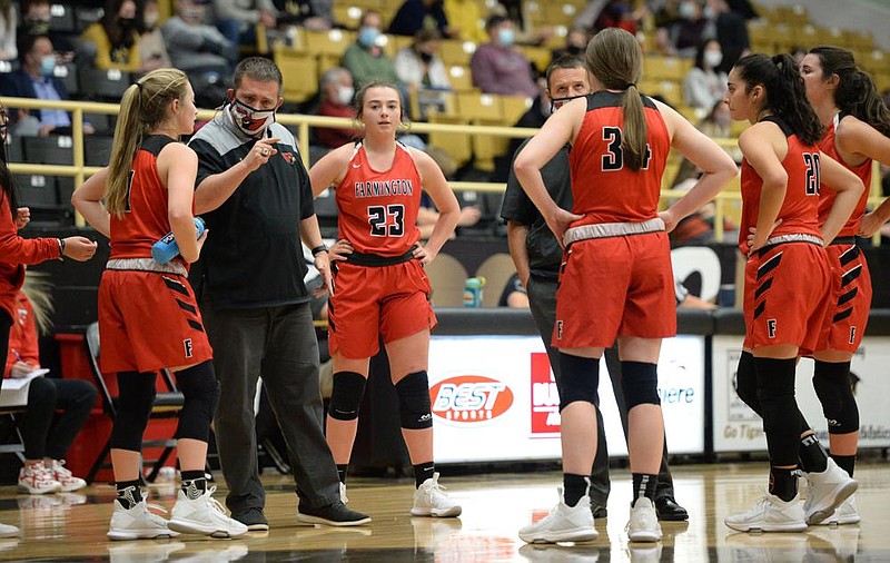 Farmington Coach Brad Johnson (second from left) has preached a “windshield mentality” this season, which he believes is starting to sink in for his Lady Cardinals. “All you’re doing is looking forward while nothing is in the rear-view mirror. With everything that we’re all dealing with right now, you’ve got to be patient,” Johnson said.
(NWA Democrat-Gazette/Andy Shupe)