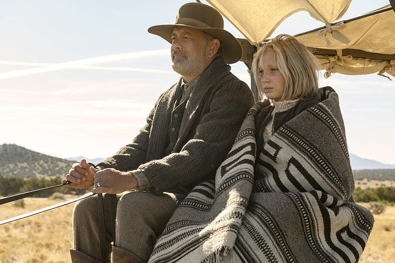 (from left) Captain Jefferson Kyle Kidd (Tom Hanks) and Johanna Leonberger (Helena Zengel) in News of the World, co-written and directed by Paul Greengrass. 