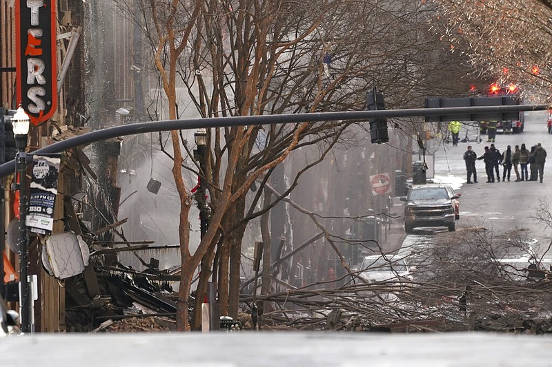 Emergency personnel work at the scene of an explosion in downtown Nashville, Tenn., Friday, Dec. 25, 2020.