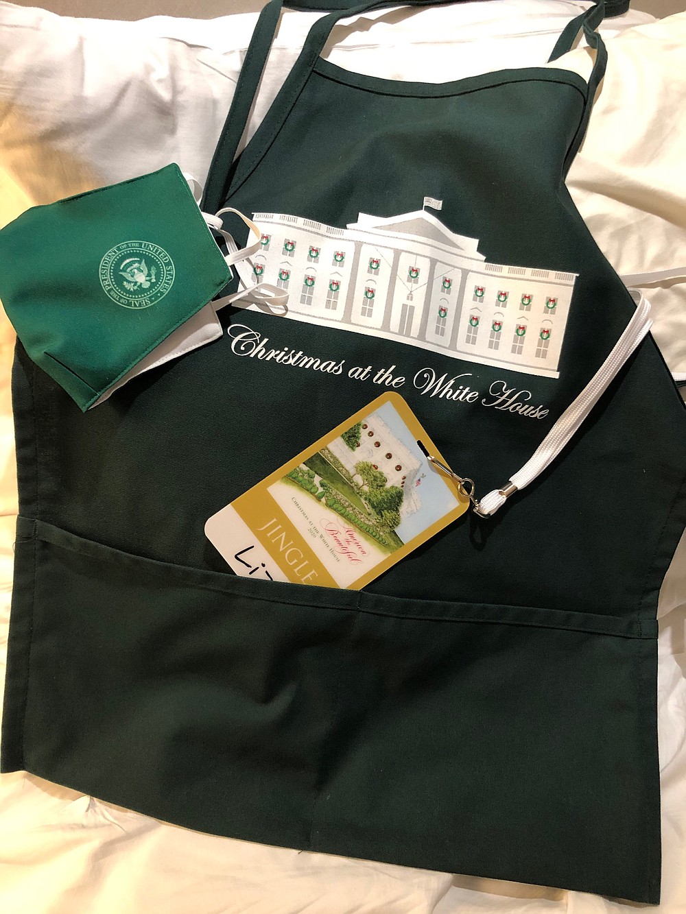 Liz Bullock’s apron, group badge and mask that she used while decorating the White House for Christmas this year. (Contributed)
