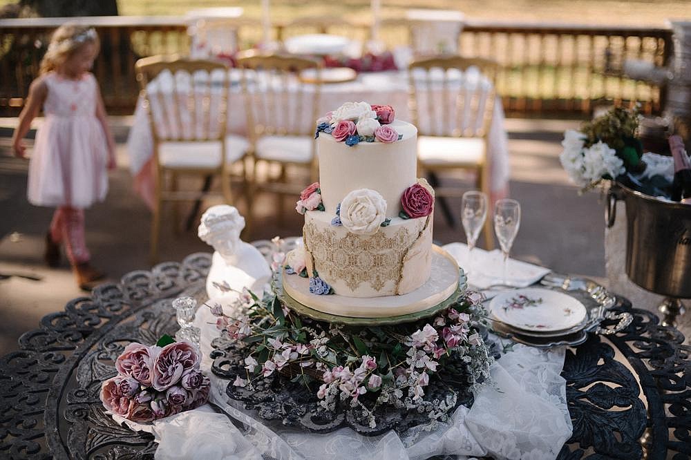 This custom buttercream wedding cake was made by Melissa Fahlstrom for an intimate celebration in the outdoor space of the Pink Rosebud, a bed & breakfast in Plattsburg, Mo.
(The New York Times/Jacob Moscovitch)