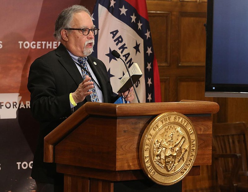 Secretary of Health Dr. Jose Romero talks about the vaccine rollout during the weekly COVID-19 press conference on Tuesday Dec. 29, at the state Capitol in Little Rock. (Arkansas Democrat-Gazette/Thomas Metthe)