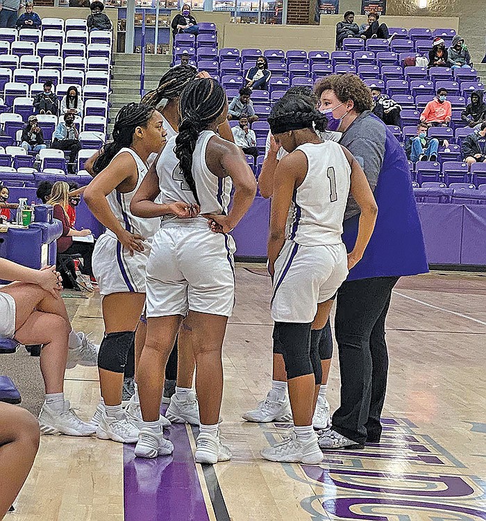 Tony Burns/News-Times El Dorado’s girls basketball team discusses strategy during their game against Camden Fairview at Wildcat Arena earlier this season. The Lady Wildcats fell to Maumelle on Tuesday and face Little Rock Parkview Thursday.