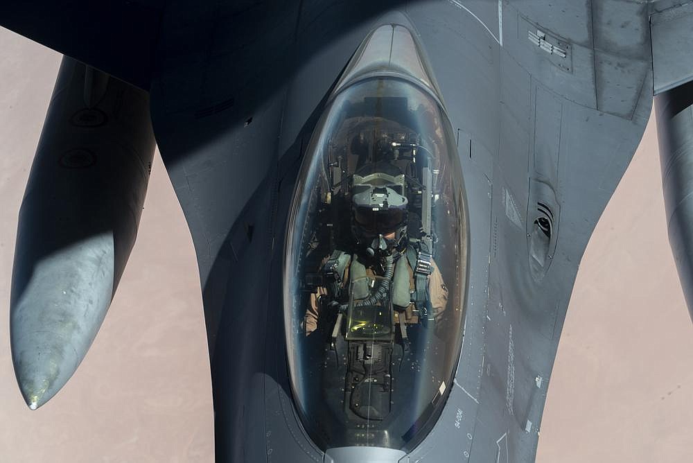 An Air Force F-16 Fighting Falcon is refueled in the air Wednesday by a KC-135 “Stratotanker” over the Persian Gulf.
(AP/U.S. Air Force/Senior Airman Roslyn Ward)