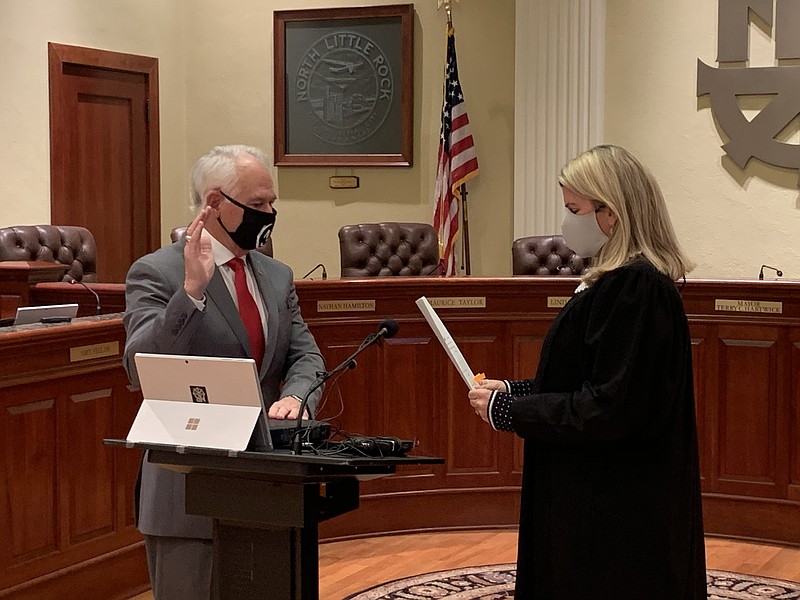 Terry Hartwick is sworn in as mayor of North Little Rock by Judge Paula Jones on Friday, Jan. 1, 2021 in the City Council chambers.