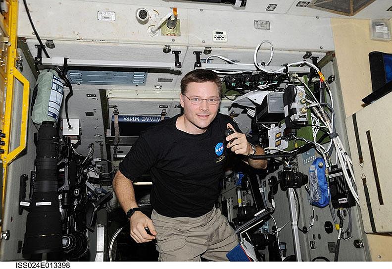 NASA astronaut Doug Wheelock uses a ham radio system in the Zvezda Service Module of the International Space Station in 2010. “It became my emotional, and a really visceral, connection to the planet,” Wheelock said of his radio conversations with Earth below.
(NASA/Doug Wheelock)