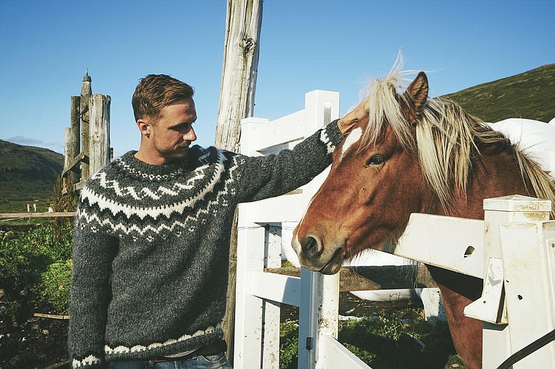 For a sweater to be designated an Icelandic lopapeysa, in the style worn by travel blogger Stephen Gollan, it must be hand-knit in Iceland with wool from Icelandic sheep.
(Courtesy of Stephen Gollan)