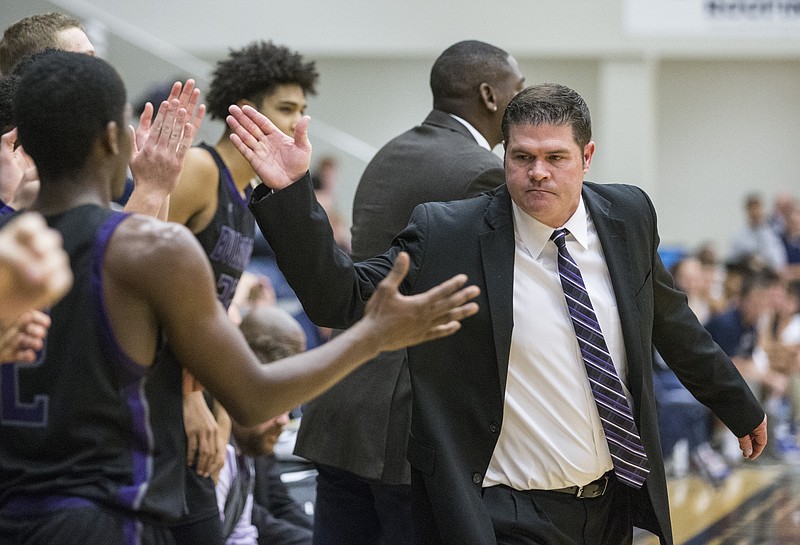 FILE -- In this file photo, Brad Stamps, Fayetteville head coach, celebrates a point vs Bentonville West Tuesday, Jan. 7, 2020, at Wolverine Arena in Centerton. (NWA Democrat-Gazette/BEN GOFF)