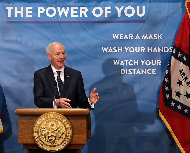 Gov. Asa Hutchinson answers a question during the weekly COVID-19 press conference on Tuesday, Jan. 5,, at the state Capitol in Little Rock. (Arkansas Democrat-Gazette/Thomas Metthe)