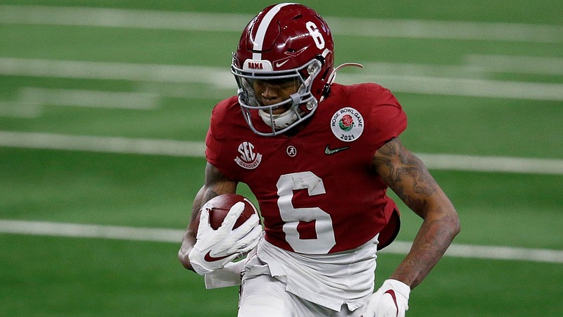 Alabama wide receiver DeVonta Smith (6) gains yardage after a catch in the first half of the Rose Bowl against Notre Dame. story.lead_photo.caption