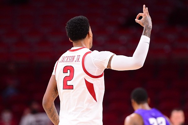 Arkansas forward Vance Jackson celebrates after making a 3-pointer during a game against Abilene Christian on Dec. 22, 2020, in Bud Walton Arena in Fayetteville.