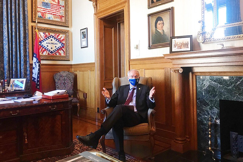Arkansas Gov. Asa Hutchinson speaks in his office at the state Capitol in Little Rock on Monday, Jan. 4, 2021. story.lead_photo.caption