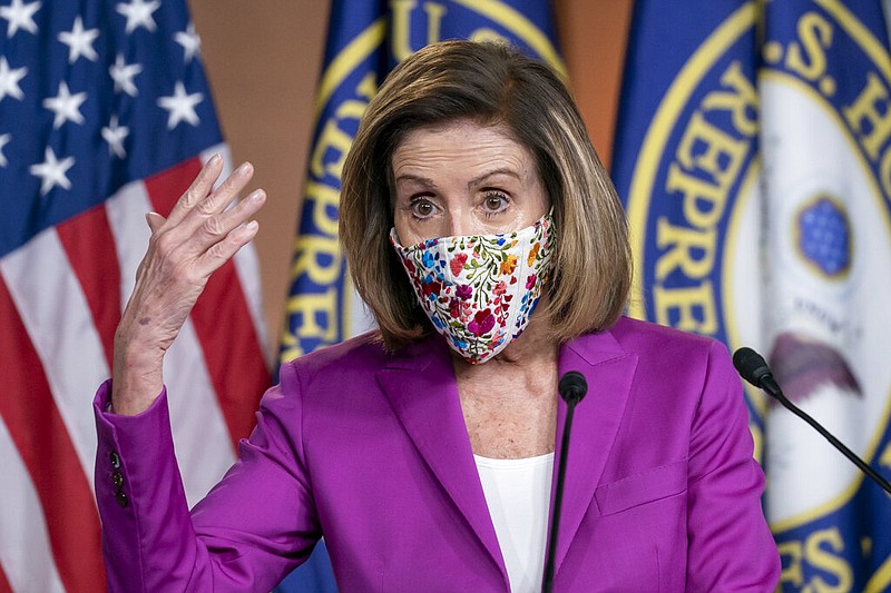 Speaker of the House Nancy Pelosi, D-Calif., holds a news conference on the day after violent protesters loyal to President Donald Trump stormed the U.S. Congress, at the Capitol in Washington, Thursday, Jan. 7, 2021.