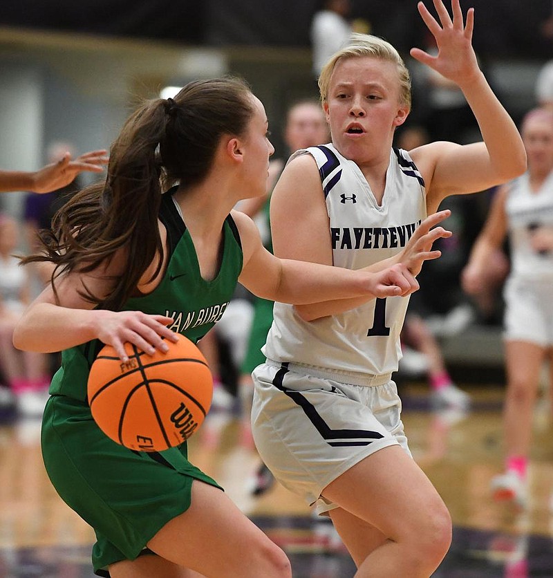 Fayetteville’s Claudia Bridges (right), shown in a game last year against Van Buren, showed her scoring ability Tuesday, finishing with six three-pointers and 30 points in a 75-41 victory over Bentonville West.
(NWA Democrat-Gazette/J.T. Wampler)