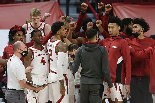 Arkansas players prepare to play, Saturday, January 9, 2021 during the first half of a basketball game at Bud Walton Arena in Fayetteville. Check out nwaonline.com/210110Daily/ for today's photo gallery.