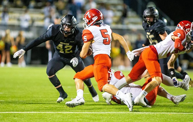 Bentonville senior linebacker Cole Joyce (42) recorded a team-high 102 tackles for the Tigers, who won the 7A-West Conference title. Joyce will continue his football career at Central Florida and is currently enrolled at the American Athletic Conference school. (Special to the NWA Democrat-Gazette/David Beach) 