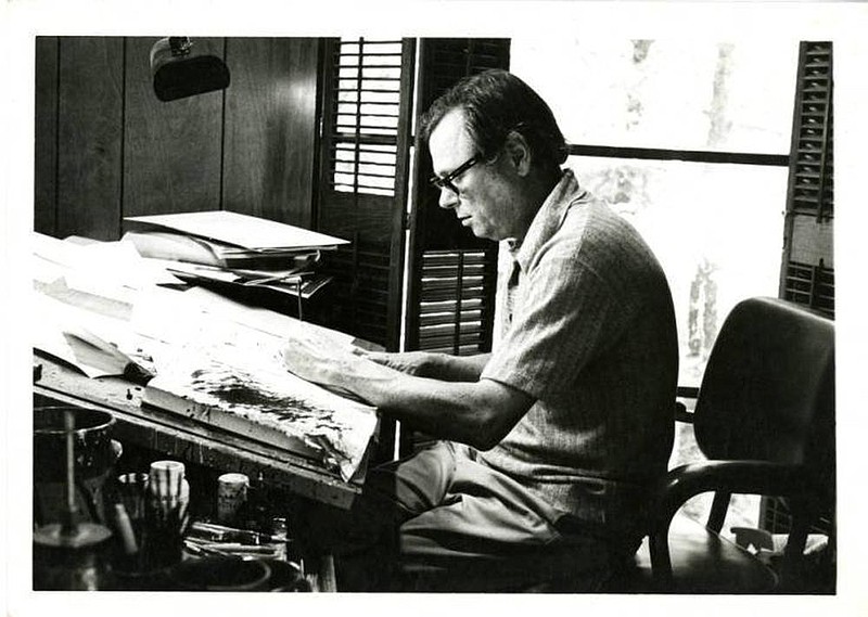 Arkansas cartoonist George Fisher is shown at work. His career spanned from the mid-1940s until his death in 2003. His political cartoons were published in major newspapers, including The Pine Bluff Commercial. 
(Special to The Commercial)