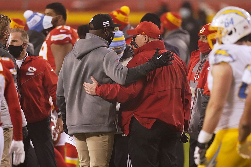 Los Angeles Chargers head coach Anthony Lynn, left, talks with Kansas City Chiefs head coach Andy Reid after an NFL football game Sunday in Kansas City. The Chargers won 38-21. story.lead_photo.caption